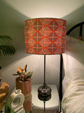 Double-sided ‘Graphic’ grey & orange Ankara fabric lampshade